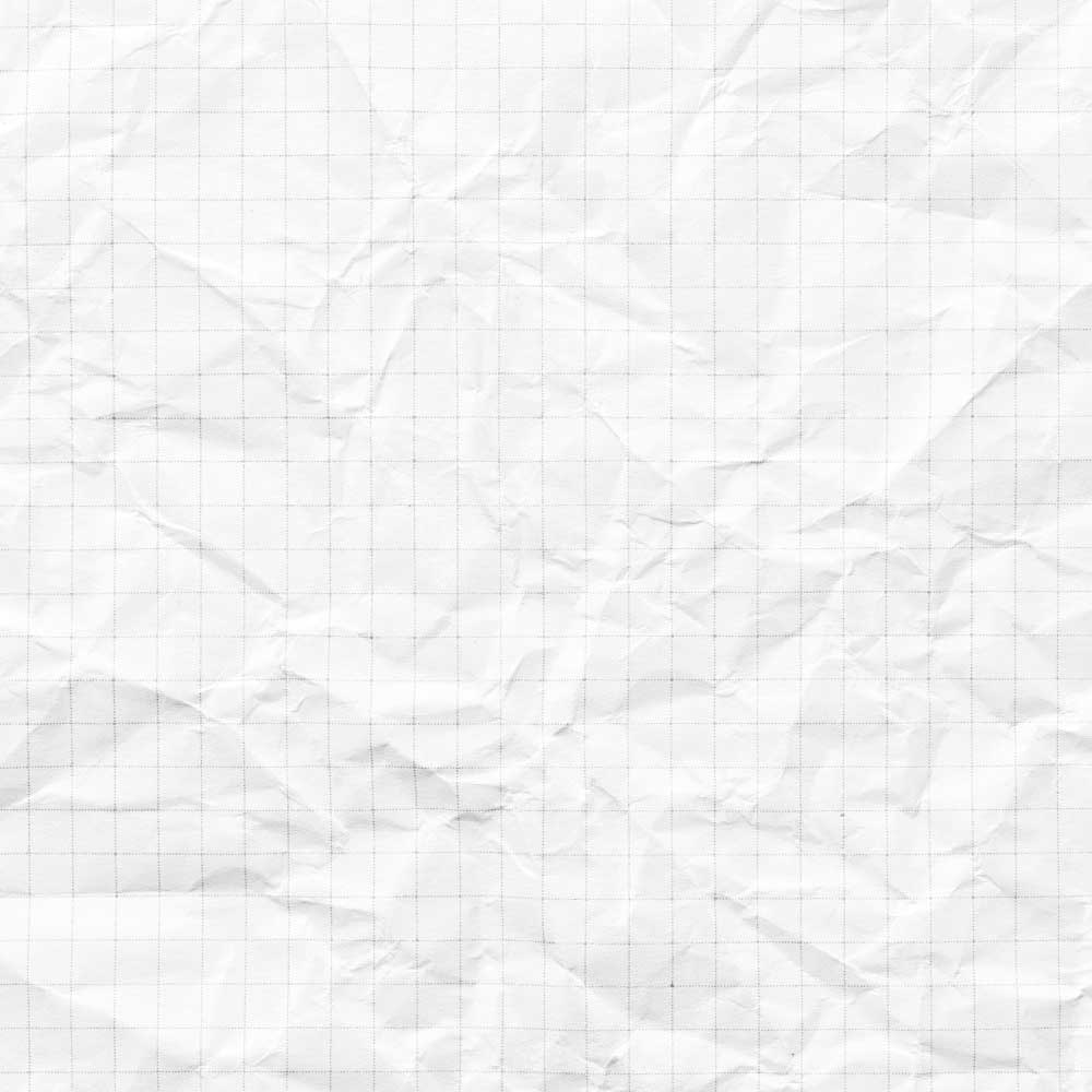 Crumbled grid paper that has been flattened out
